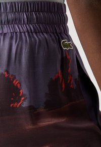 Lacoste Auduma bikses - neva purple