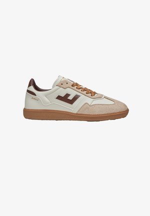 Leather and suede sneakers in cream with a brown logo, brown laces, and a textured rubber sole. Accents include a tan suede panel.