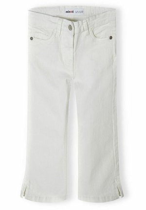 White children’s jeans with front pockets, belt loops, button closure, and small side slits at the hem.
