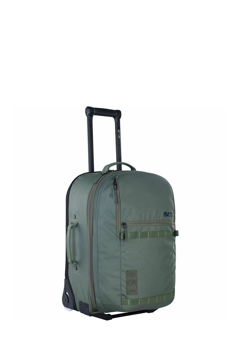 Valigia con rotelle in tessuto verde oliva, dotata di manico retrattile, numerosi scomparti con cerniera e base piatta con ruote.