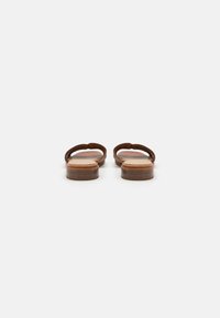 Marco Tozzi Slip-on sandaler - cognac