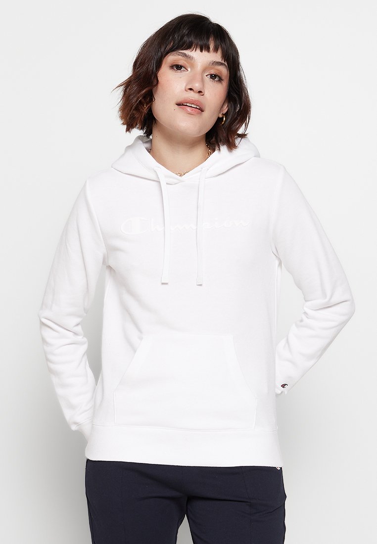 Sudadera blanca con cordón, bolsillo delantero y un discreto detalle de logo. Tejido suave con un corte relajado y mangas largas.