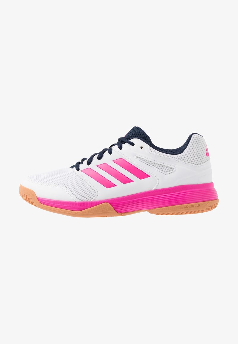 White athletic shoe with pink accents, navy blue tongue, mesh upper for breathability, durable rubber sole, and three stripes design.