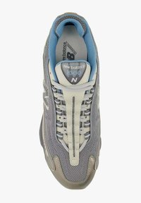 Gray and beige New Balance 1000 running shoe with blue inner lining and detailed mesh upper, viewed from above.