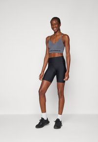 Under Armour VANISH SEAMLESS LOW - Sport-BH med lätt stöd - castlerock/black