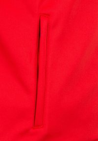 JAKO CLASSICO - Laufjacke - red