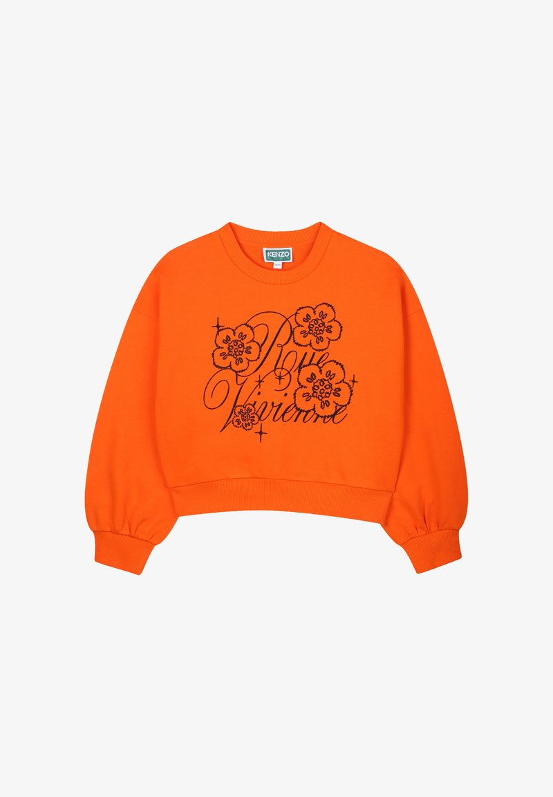 Sweatshirt orange coupé avec broderie florale noire et design textuel. Présente des poignets et un col côtelés. Matière en coton doux.