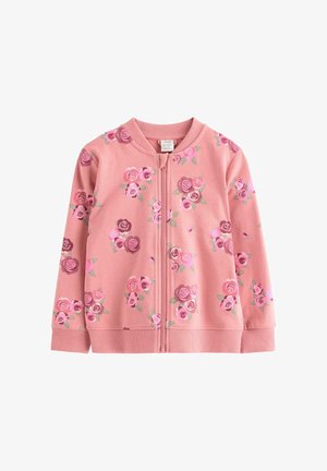 Veste à fermeture éclair rose pour enfants avec motifs floraux de roses multicolores et poignets et ourlet en côte, posée à plat sur fond blanc.