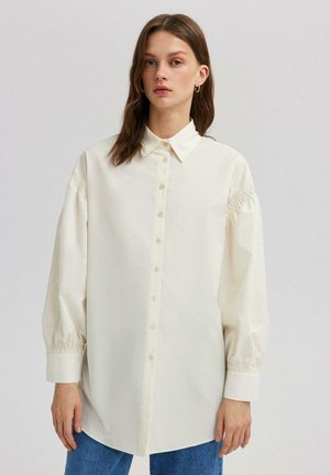 RUBBER DETAIL  - Button-down blouse - beige