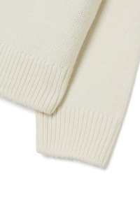 Hellecremefarbener Strickpullover aus Material mit gerippter Textur. Verfügbar mit gerollten Bündchen und einem nahtlosen Design für ein sauberes Finish.