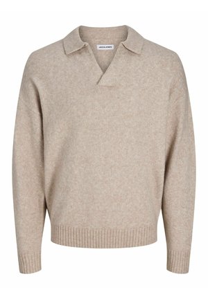 Suéter de punto beige con cuello en V y cuello corto. Presenta puños y dobladillo de canalé, hecho de una tela suave y texturizada.