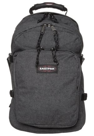 Sac à dos Eastpak en tissu texturé gris foncé ; comprend une poignée supérieure, une poche avant avec fermeture éclair et des bretelles réglables pour un transport sécurisé.