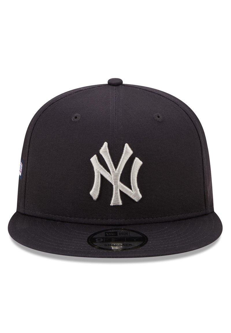 ny hat with patches