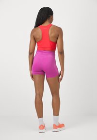 HOKA ELARO BIKE SHORT - Leggings - fuschia