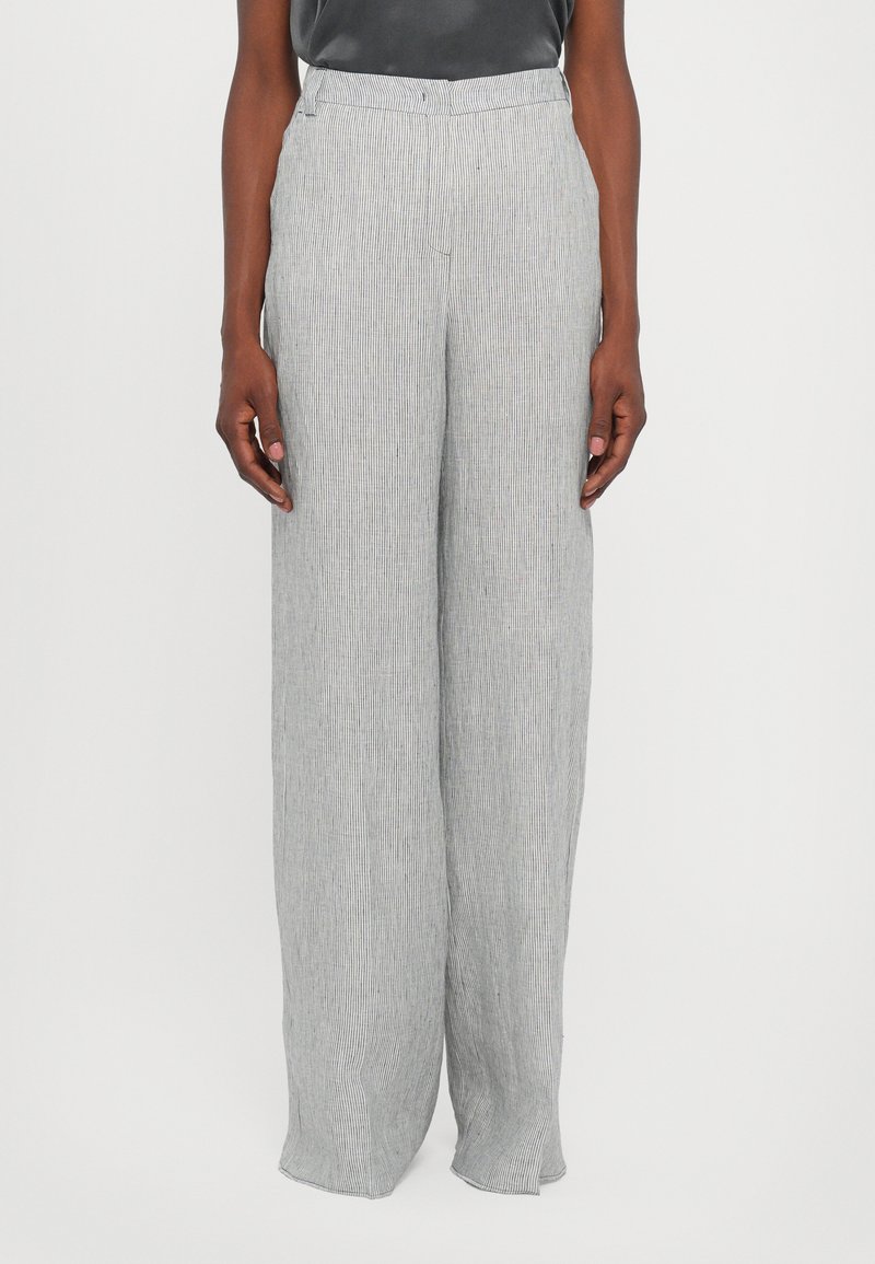 Wide-leg pants in a light gray fabric with thin, vertical stripes; features a flat front, belt loops, and a relaxed fit.