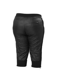 Zwarte cropped broek met een gewatteerd patroon, elastische tailleband, zijritsen en contrasterend dik materiaal op de onderbenen.