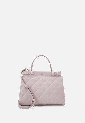 Light pink quilted leather handbag with top handle and adjustable shoulder strap against a plain light background.