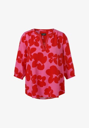 Pink blouse with large red floral patterns, V-neckline, and three-quarter sleeves with elastic cuffs.