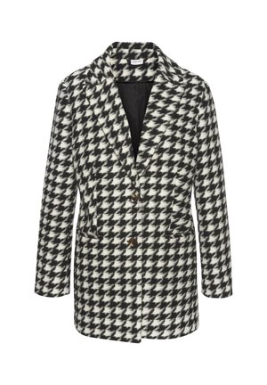 Blazer à motif pied-de-poule noir et blanc, avec un col cranté, deux poches frontales et des fermetures à boutons marron sur un tissu texturé.