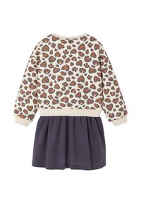 Beige Langarmoberteil mit orangefarbenem und grauem herzförmigen Leopardenmuster, kombiniert mit einem dunkelvioletten, gerafften Rock.