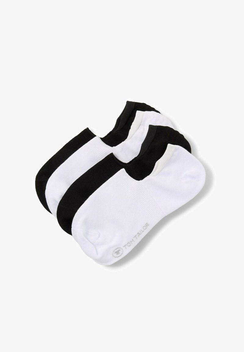 Trois paires de socquettes basses en noir et blanc, disposées en chevauchement sur un fond blanc.