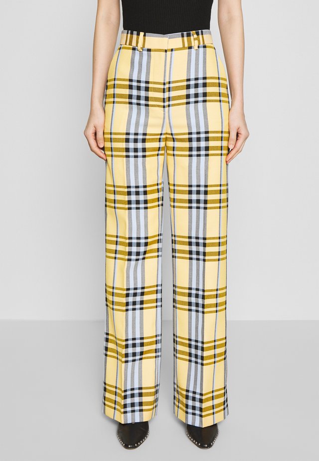 BLINIE DASHING - Pantalones - banana
