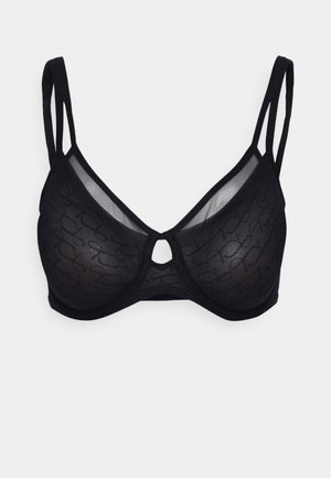 Musthave mustusega rinnahoidja, millel on pehmed võrgusilmad ja peen mustriga cups. Sellel on reguleeritavad rihmad ja keskosas võtiava detail. Minimalistlik sisustus.