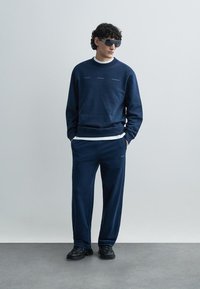 Holzweiler RELAXED TROUSERS - Donji dijelovi trenirke - blue