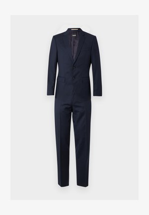 Completo blu navy con chiusura a due bottoni, revers a taglio e taschino sul petto. Vestibilità sartoriale con texture liscia e un motivo interno sottile.