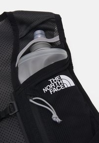 The North Face SUNRISER RUN VEST UNISEX - Sac avec poche d'eau - black/white