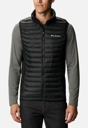 Schwarze, gepolsterte Weste mit vertikalem Steppdesign, hohem Kragen, Frontreißverschluss und seitlichen Taschen. Getragen über einem grauen Langarmshirt.