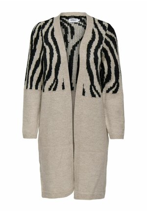 Stickad cardigan i beige med svarta zebraränder. Öppen front, långa ärmar och en avslappnad passform. Mjuk textur med ribbade ärmslut och fåll.