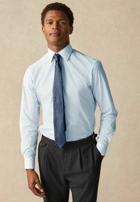 Next Krekls - blue print blue tie