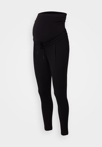 Schwarze Schwangerschaftsleggings mit breitem, flexiblem Bund und Kordelzug-Detail. Weicher, dehnbarer Stoff, der für Komfort um den Bauch herum sorgt.