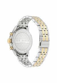 Stainless steel watch with a silver and gold two-tone bracelet, round case, dual pushers, and patterned case back displaying brand logo.