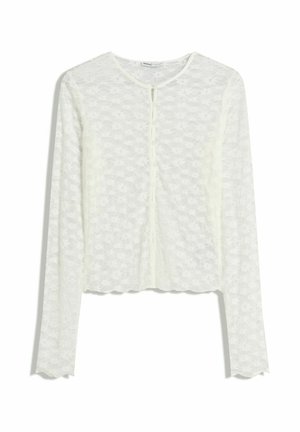Top en dentelle blanche à manches longues avec un col rond, fermeture par boutons, ourlet festonné et motif floral complexe sur l'ensemble.