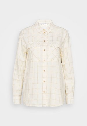 Kremowa koszula w kratę z złotą siatką, dwie kieszenie na piersiach, zapięcie na guziki i długie rękawy. Wykonana z miękkiego, lekkiego materiału.