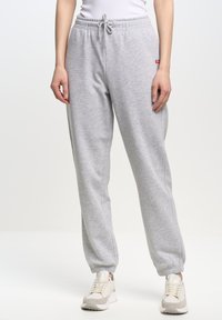 YEVA - Trainingsbroek - grau