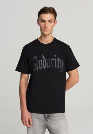 CON PATCH SIMILPELLE - T-shirt con stampa - nero