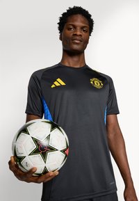 adidas Performance MANCHESTER UNITED - Sportfelső - black/blue/tribe yellow