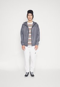Ellesse TERRAZZO JACKET - Corta-vento - dark grey