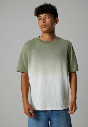 Olive green and white gradient T-shirt made from soft cotton. Features a round neckline and short sleeves, with a relaxed fit.