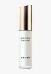MAC Skinfinish Lightstruck säihkepuuder frostiga klaaspudel ja läikiv kullakork, millel on must tekst valgel taustal.