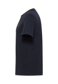 Navy blue cotton t-shirt with a classic crew neck, short sleeves, and a subtle front logo detail. Soft texture, standard fit.
