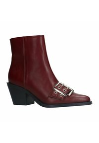Burgundy leather ankle boot with a pointed toe, silver buckle detail on the side, and a chunky black heel. Smooth texture with minimal stitching.