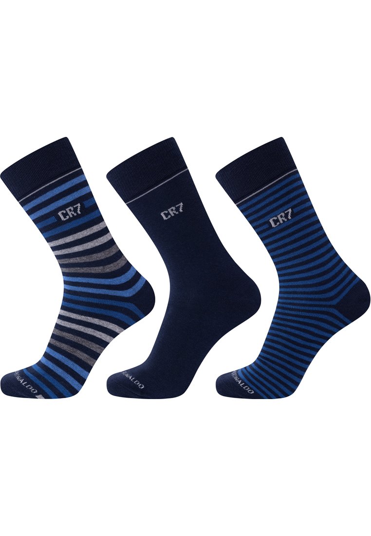 Tre paia di calzini: uno con righe grigie e blu, e due in tinta unita navy con righe blu. Presentano un bordo a coste e il logo CR7.