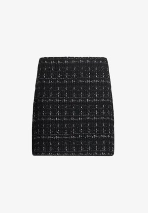 Gonna nera in tessuto con un motivo testurizzato e intrecciato. Presenta una silhouette strutturata e sottili accenti bianchi sparsi sul tessuto.