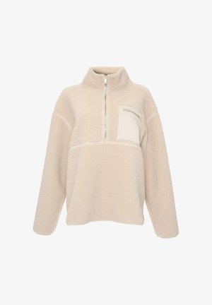 Beige fleece pullover with half-zip front, high collar, long sleeves, and zippered chest pocket on the left side.