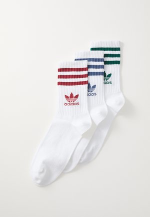 White cotton crew socks set, featuring three pairs with colored stripes: red, blue, and green. Each pair has the Adidas trefoil logo.