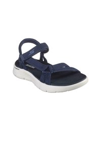 Sandale de sport bleu marine avec des sangles texturées, des fermetures réglables à crochets et boucles, et une semelle blanche rembourrée pour un confort amélioré.